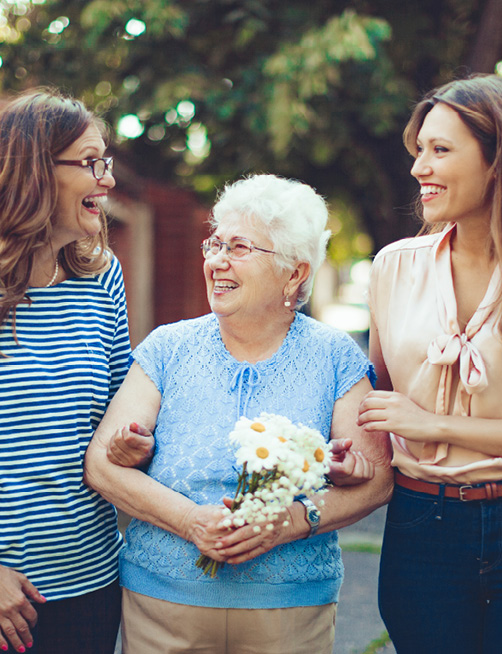 3 generations of women walking together